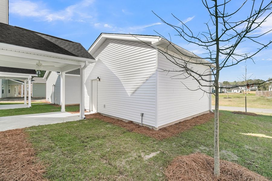 Exterior details and patio area of a home in Six Oaks, Summerville (Image 28).