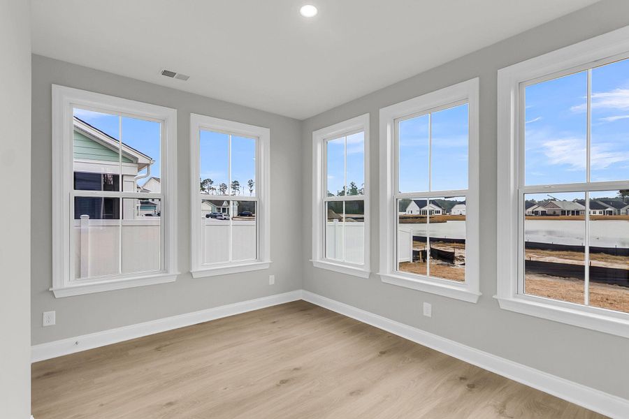 Spacious, unfurnished interior of a new home in Tidewater at Lakes of Cane Bay, Summerville (Image 19).