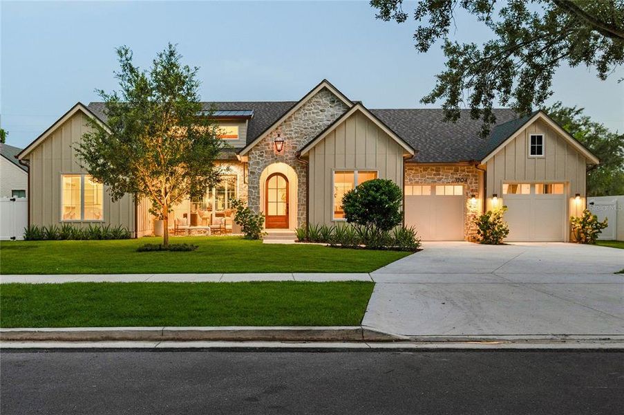 Front exterior of a new home in , Orlando, FL, highlighting curb appeal (Image 22). Front exterior of a new home in , Orlando, FL, highlighting curb appeal (Image 22).