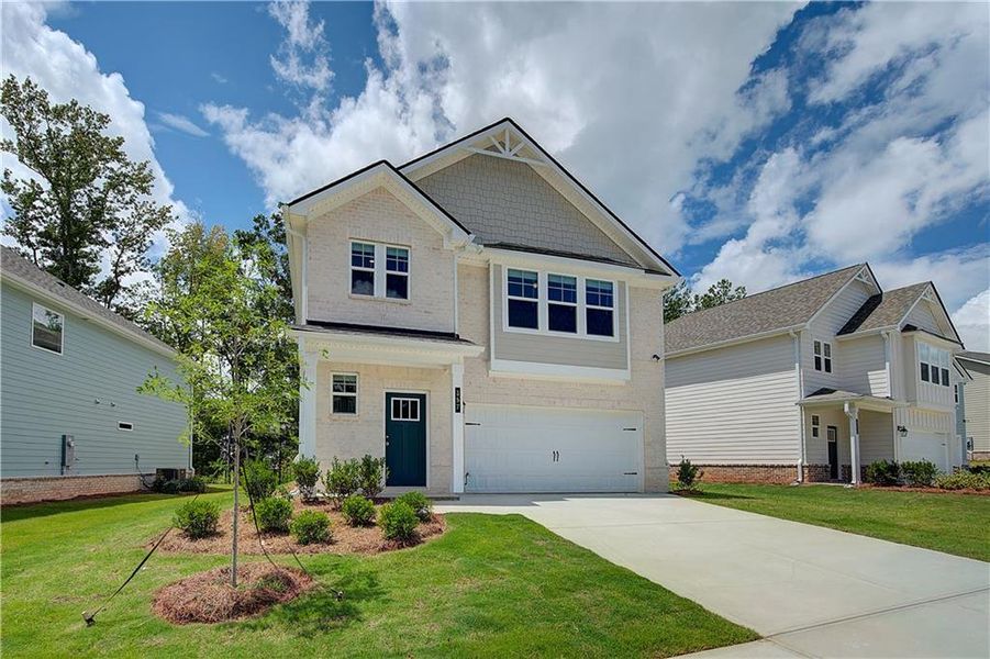Front exterior of a new home in Westminster, Covington, GA, highlighting curb appeal (Image 16).