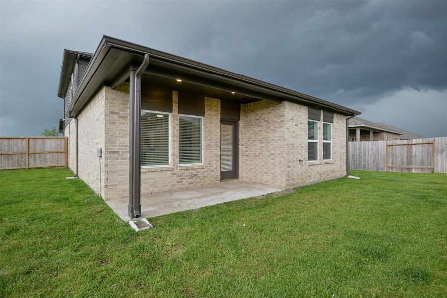 Front exterior of a new home in River Ranch Meadows, Dayton, TX, highlighting curb appeal (Image 14). Front exterior of a new home in River Ranch Meadows, Dayton, TX, highlighting curb appeal (Image 14).