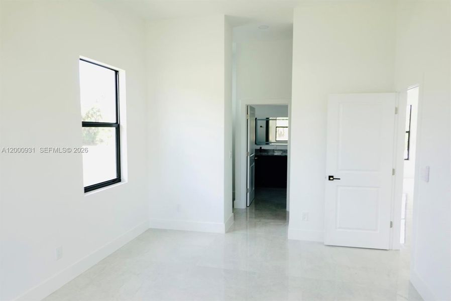 Spacious, unfurnished interior of a new home in , Port Charlotte (Image 21).