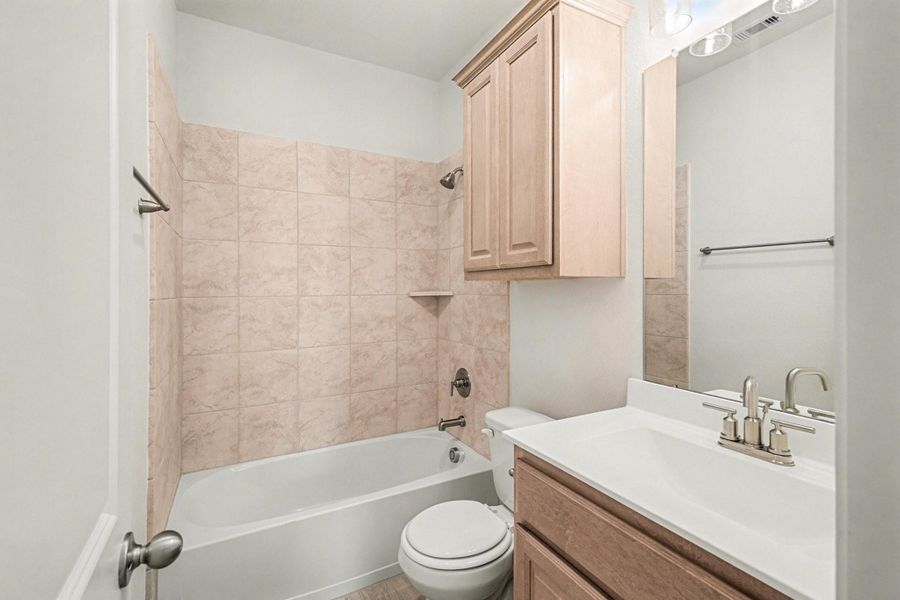 Furnished interior view inside a new home in Clear View Estates, Willis (Image 10).