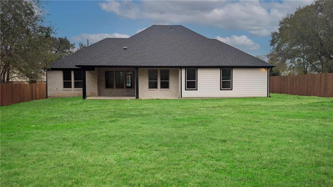 Exterior details and patio area of a home in , Denton (Image 4).