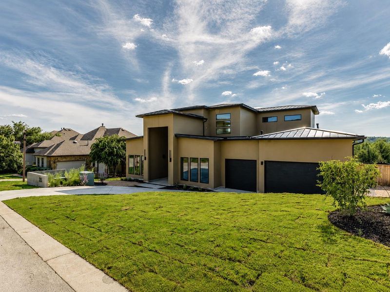 Front exterior of a new home in , Dripping Springs, TX, highlighting curb appeal (Image 2). Front exterior of a new home in , Dripping Springs, TX, highlighting curb appeal (Image 2).
