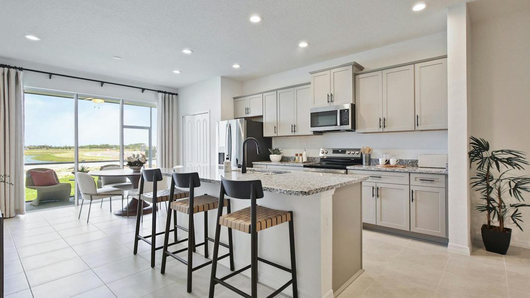 Furnished interior view inside a new home in Palm Grove Real Estate and Homes for Sale in Lakewood Ranch, FL - Neal Communities, Lakewood Ranch (Image 30).
