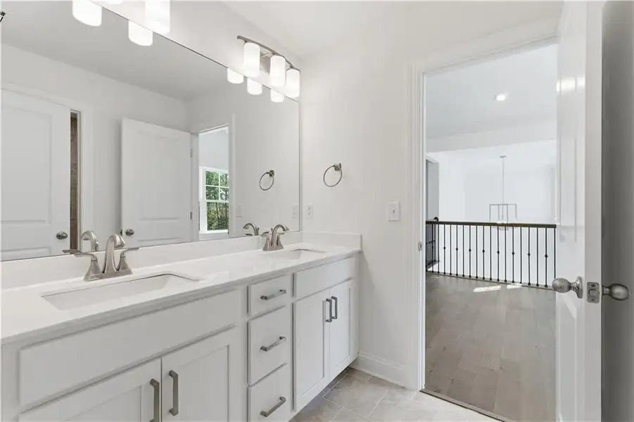 Furnished interior view inside a new home in The Estates at Hurricane Pointe, Douglasville (Image 38).