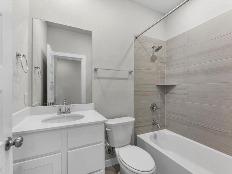 Furnished interior view inside a new home in Mason Woods, Cypress (Image 10).