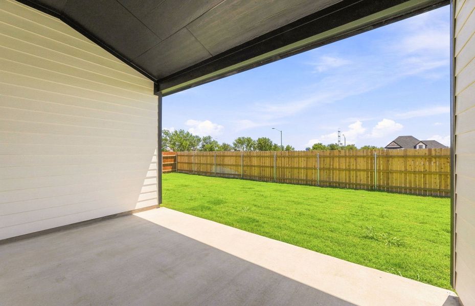 Exterior details and patio area of a home in Kuempel Estates, Pflugerville (Image 26).