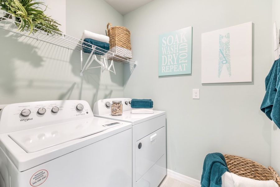 Representative furnished interior of a home built from the Cali by D.R. Horton in Coral Bay - Express & Tradition, North Fort Myers (Image 6).