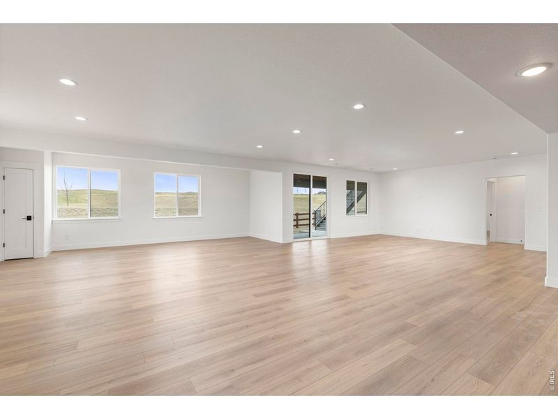Spacious, unfurnished interior of a new home in RainDance, Windsor (Image 32).