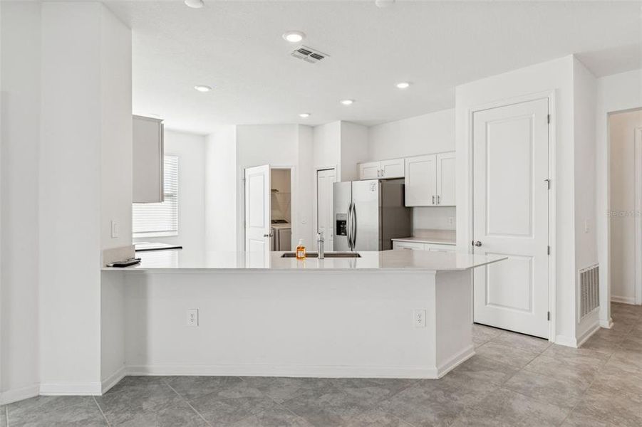 Furnished interior view inside a new home in Ranches at Lake McLeod, Eagle Lake (Image 8).