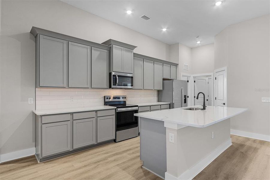 Furnished interior view inside a new home in , Port Charlotte (Image 8). Furnished interior view inside a new home in , Port Charlotte (Image 8).