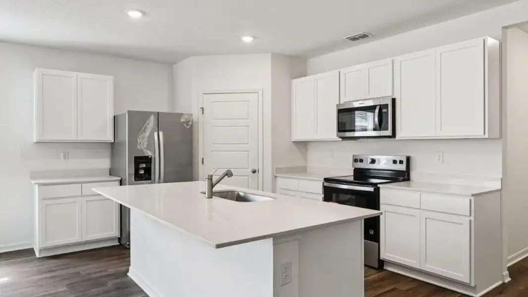 Furnished interior view inside a new home in Cascades, Davenport (Image 9).