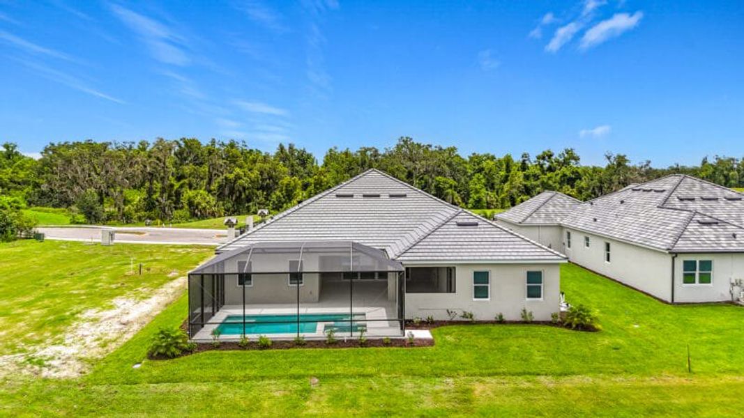 Exterior details and patio area of a home in River Preserve Estates, Parrish (Image 31).