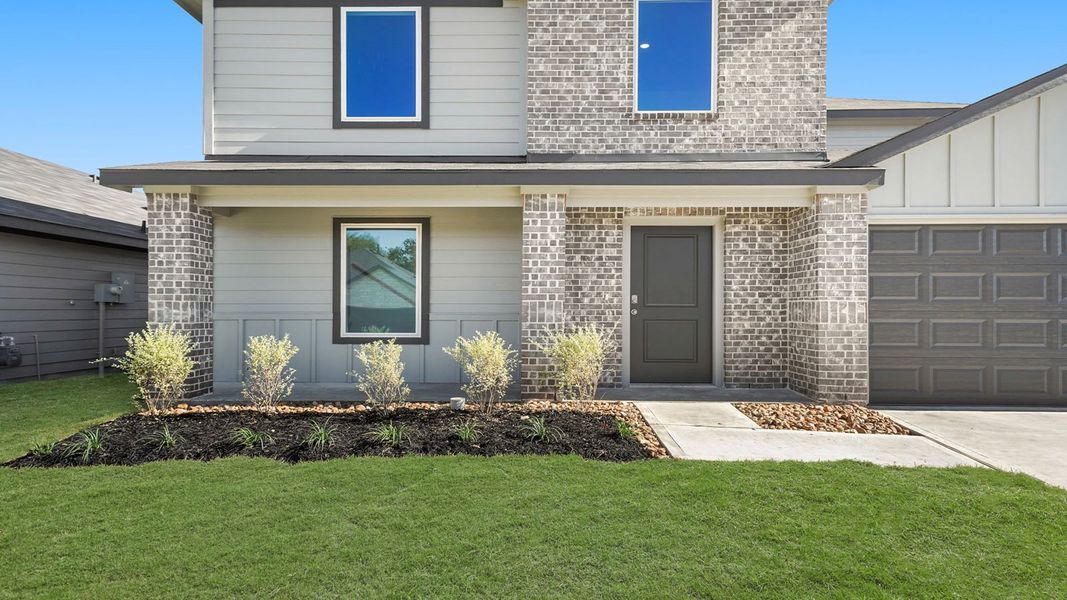 Exterior details and patio area of a home in Westward Pointe, Sealy (Image 3).