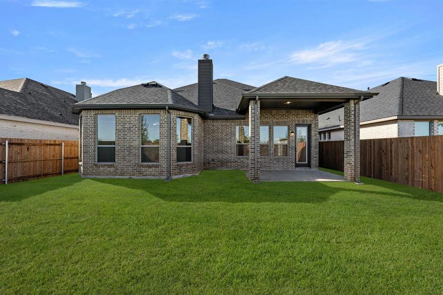 Exterior details and patio area of a home in Somerset - Phase 5, Mansfield (Image 3). Exterior details and patio area of a home in Somerset - Phase 5, Mansfield (Image 3).