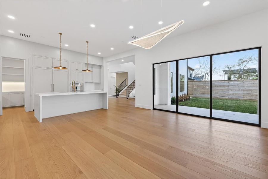 Dinning area with wet bar and views of the backyard.