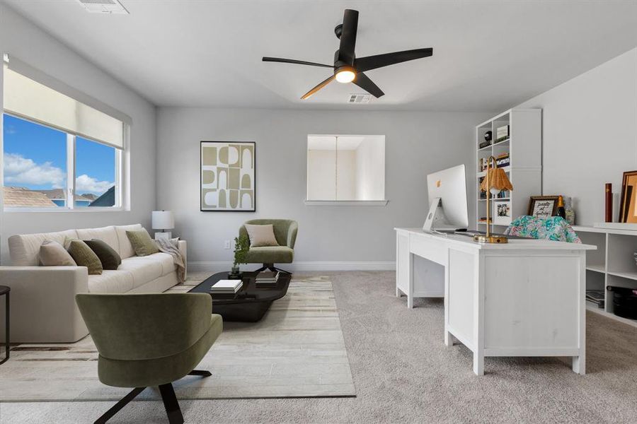 Office space with carpet flooring and ceiling fan
