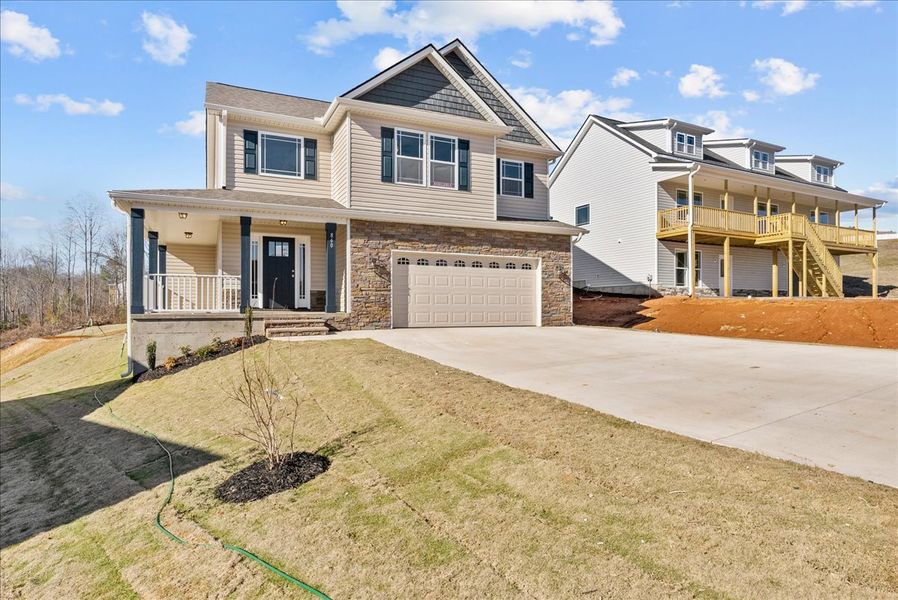 Representative exterior photo of a completed home built from the Emilia by Enchanted Homes in Messer Farms, Inman, SC (Image 2). Representative exterior photo of a completed home built from the Emilia by Enchanted Homes in Messer Farms, Inman, SC (Image 2).