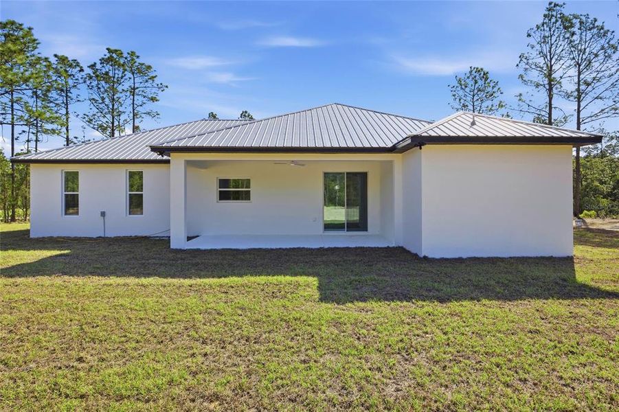 Exterior details and patio area of a home in , Ocala (Image 29).