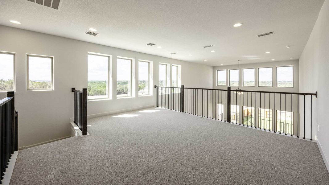 Spacious, unfurnished interior of a new home in Eldorado At Santa Rita Ranch 50', Liberty Hill (Image 8).