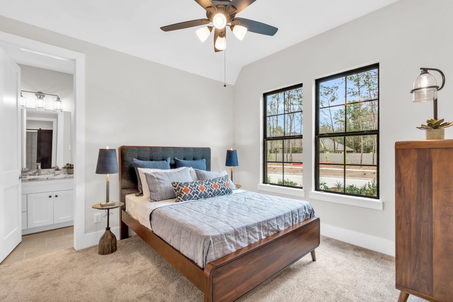 Furnished interior view inside a new home in ARTAVIA, Conroe (Image 13).