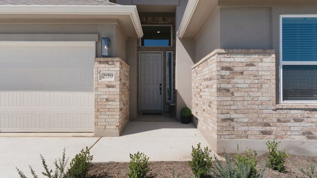 Representative exterior details of a home built from the Brooks by Chesmar Homes in University Heights, Round Rock (Image 3).