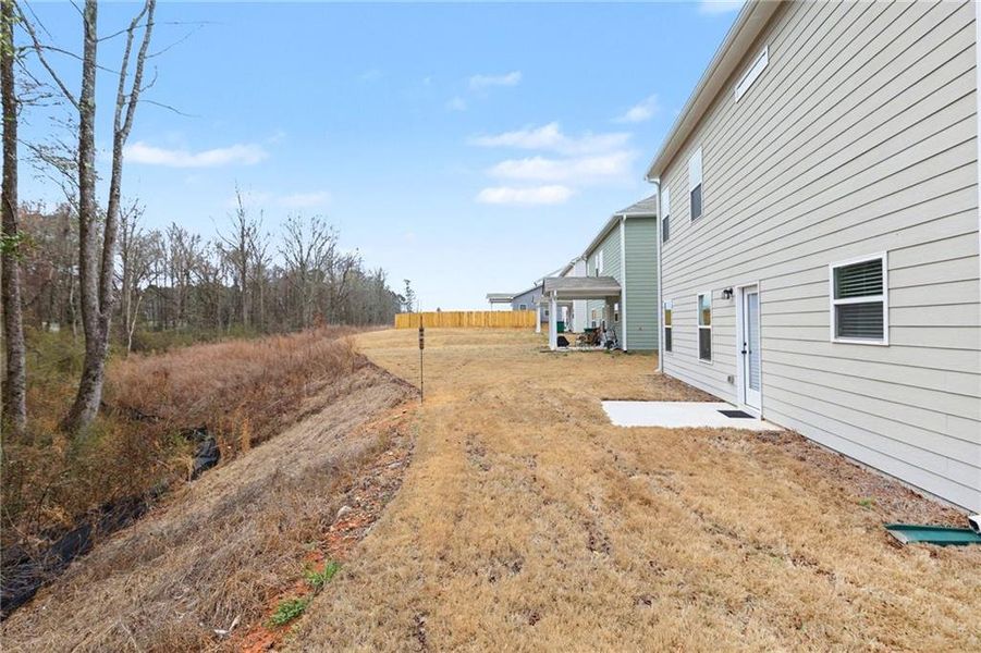 Exterior details and patio area of a home in Morgan Landing, Carrollton (Image 3).