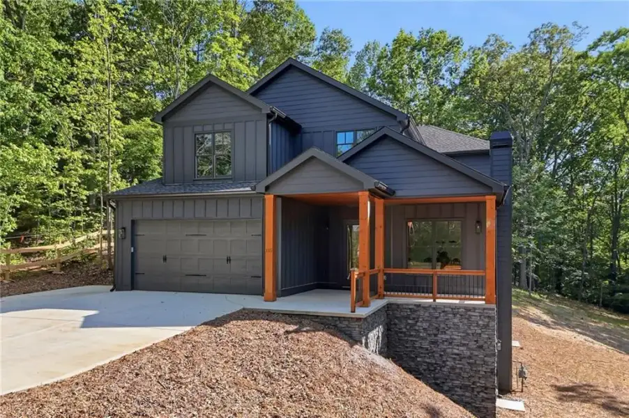 Front exterior of a new home in , Canton, GA, highlighting curb appeal (Image 32).