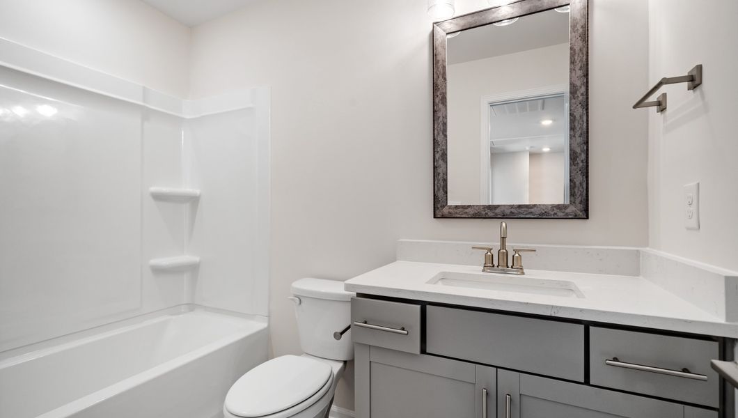 Representative furnished interior of a home built from the LONDON by D.R. Horton in Adams Glen, Greenville (Image 10).