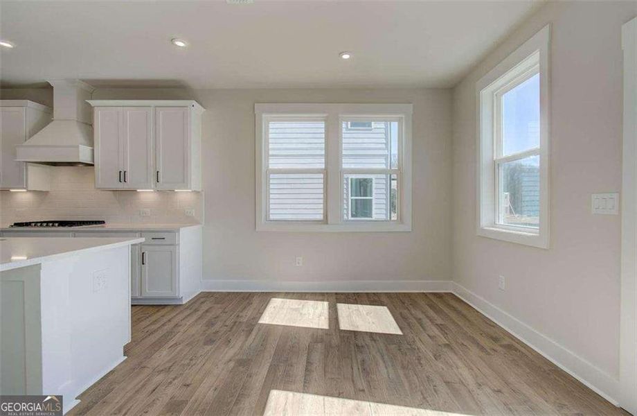 Spacious, unfurnished interior of a new home in The Paddocks at Doc Hughes, Buford (Image 46).