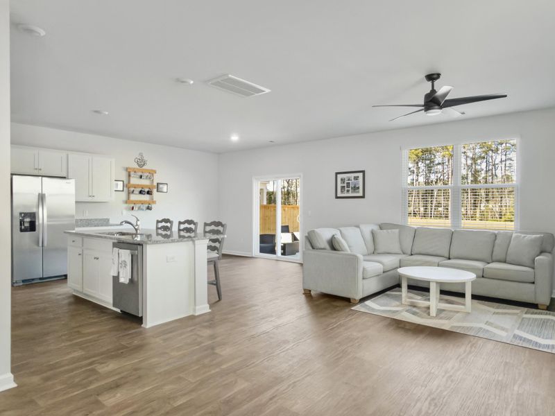 Furnished interior view inside a new home in Pine Hills at Cane Bay, Summerville (Image 7). Furnished interior view inside a new home in Pine Hills at Cane Bay, Summerville (Image 7).