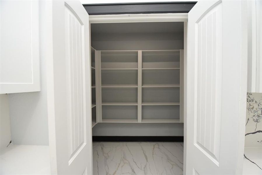 Spacious walk-in pantry.