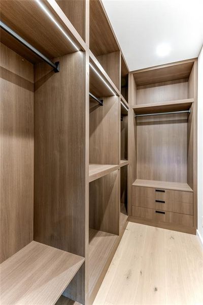 All secondary rooms are complete with custom closets with integrated lighting.