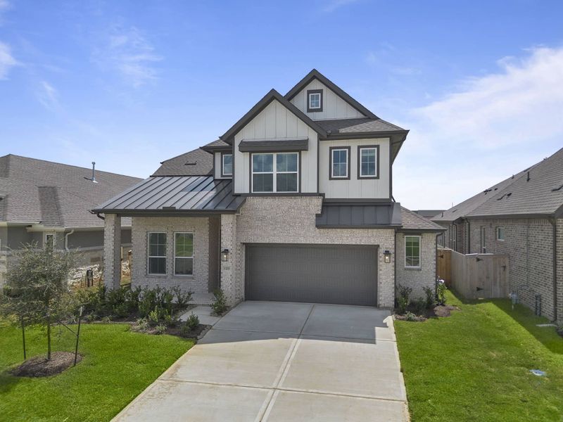 Front exterior of a new home in Wood Leaf Reserve, Tomball, TX, highlighting curb appeal (Image 24).