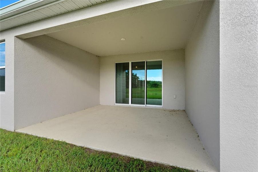 Exterior details and patio area of a home in , Dade City (Image 23).