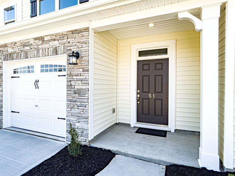 Front exterior of a new home in Fairview Village Townhomes, Simpsonville, SC, highlighting curb appeal (Image 2).