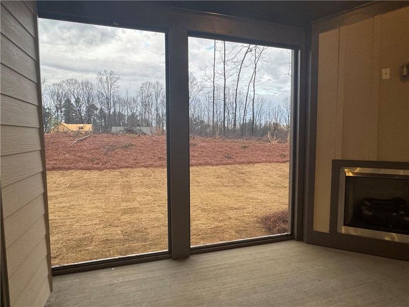 Exterior details and patio area of a home in Rosewood Lake Preserve, Hoschton (Image 21).
