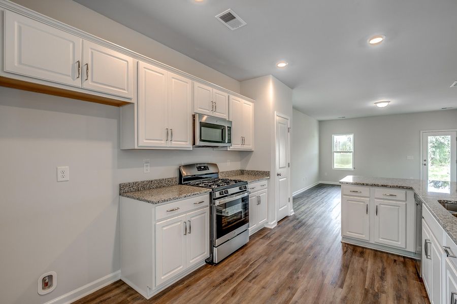 Furnished interior view inside a new home in Six Oaks, Summerville (Image 6).