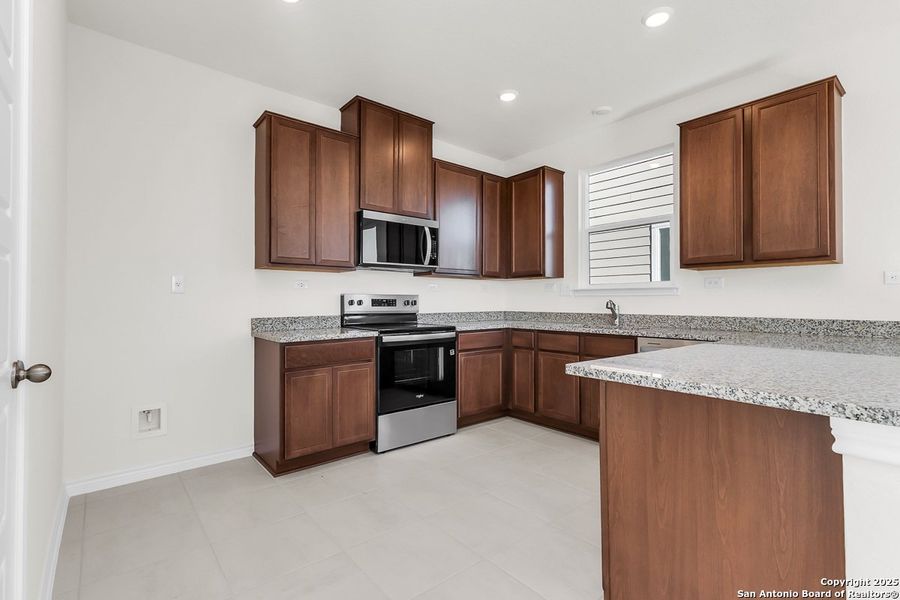 Furnished interior view inside a new home in Spanish Trails, San Antonio (Image 8).