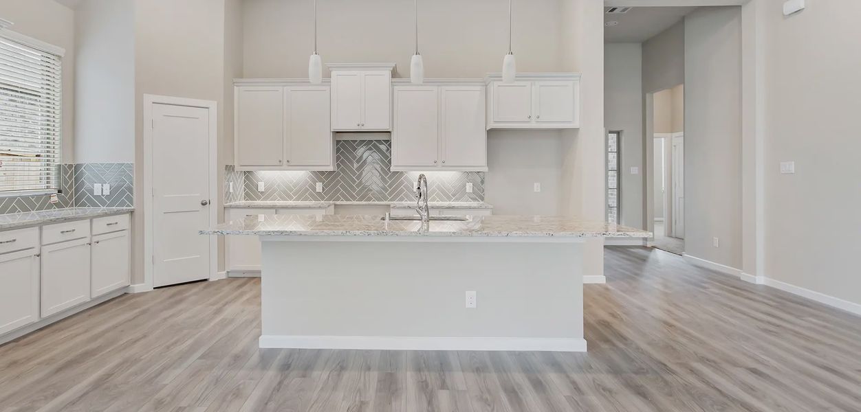 Representative furnished interior of a home built from the Sunnyside by Chesmar Homes in Wood Leaf Reserve, Tomball (Image 4).