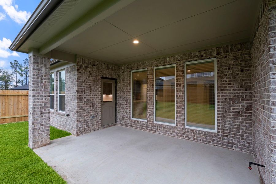 Exterior details and patio area of a home in Barton Creek Ranch, Conroe (Image 4). Exterior details and patio area of a home in Barton Creek Ranch, Conroe (Image 4).
