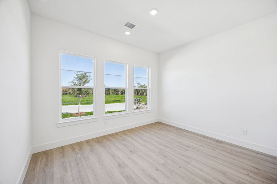 Representative unfurnished interior of a home built from the Percy by Normandy Homes in Rainwater Crossing, Celina (Image 12).