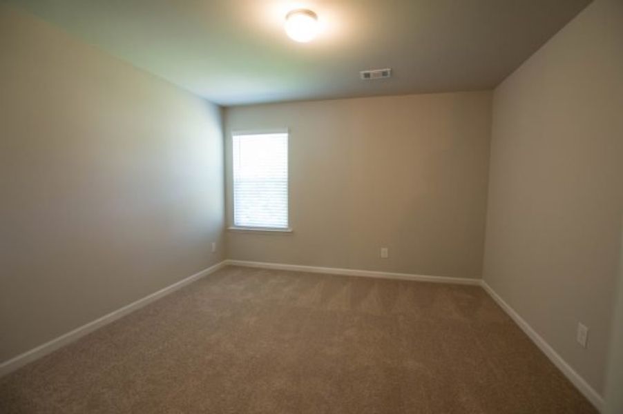 Representative unfurnished interior of a home built from the Glade by Piedmont Residential in Meadowyn, Cartersville (Image 14).
