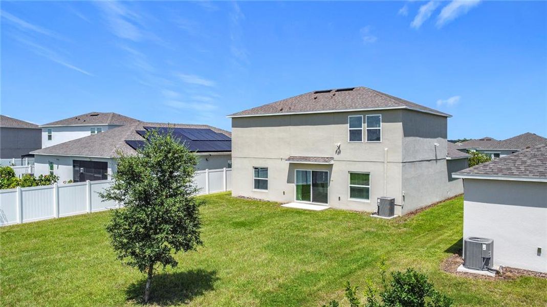 Front exterior of a new home in , Kissimmee, FL, highlighting curb appeal (Image 1).