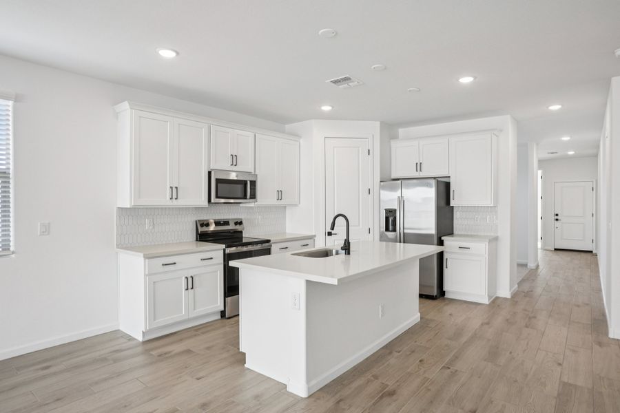 Kitchen featuring the Harmony Collection. Finishes and options may vary by community