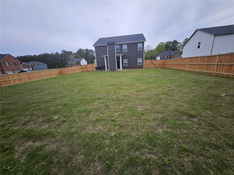 Exterior details and patio area of a home in Fern Dale, Fairburn (Image 3).