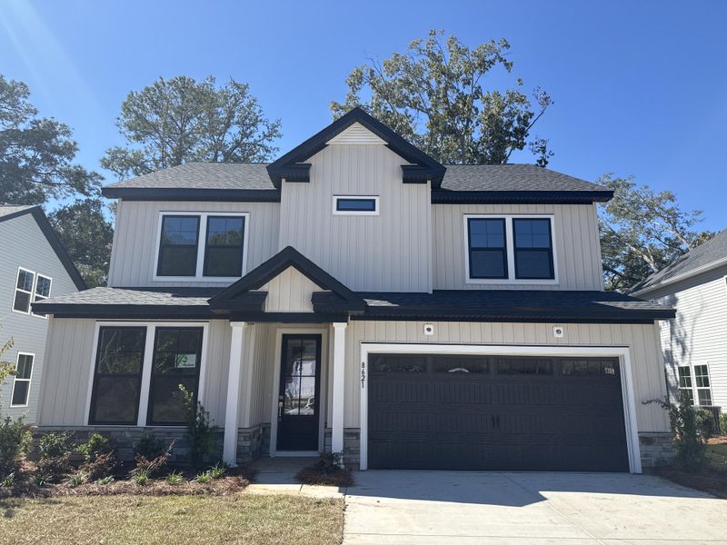 Front exterior of a new home in , North Charleston, SC, highlighting curb appeal (Image 23). Front exterior of a new home in , North Charleston, SC, highlighting curb appeal (Image 23).