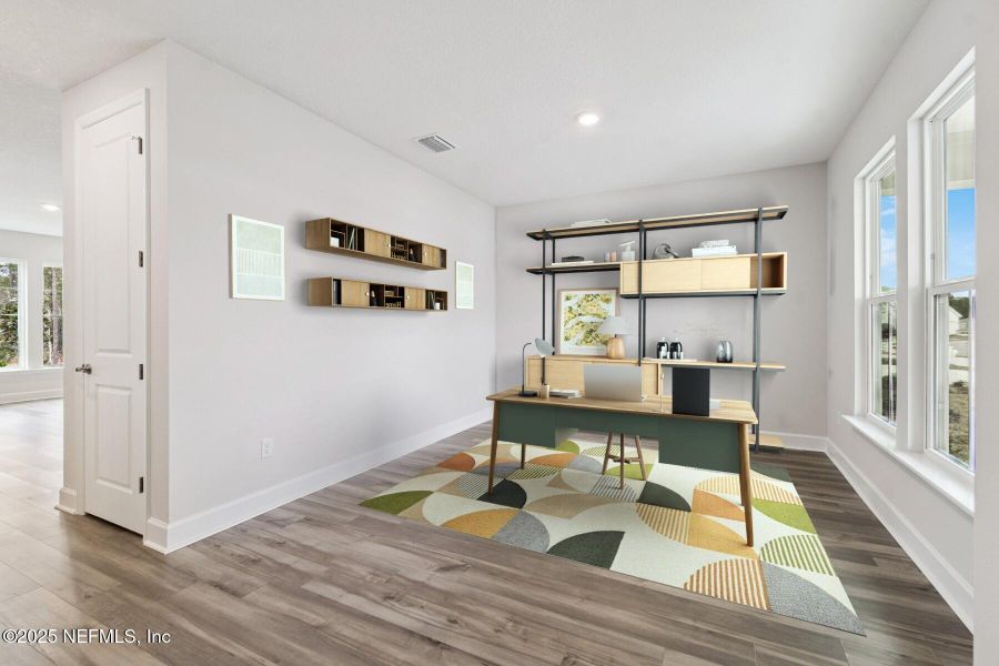 Furnished interior view inside a new home in Tributary 70', Yulee (Image 13).